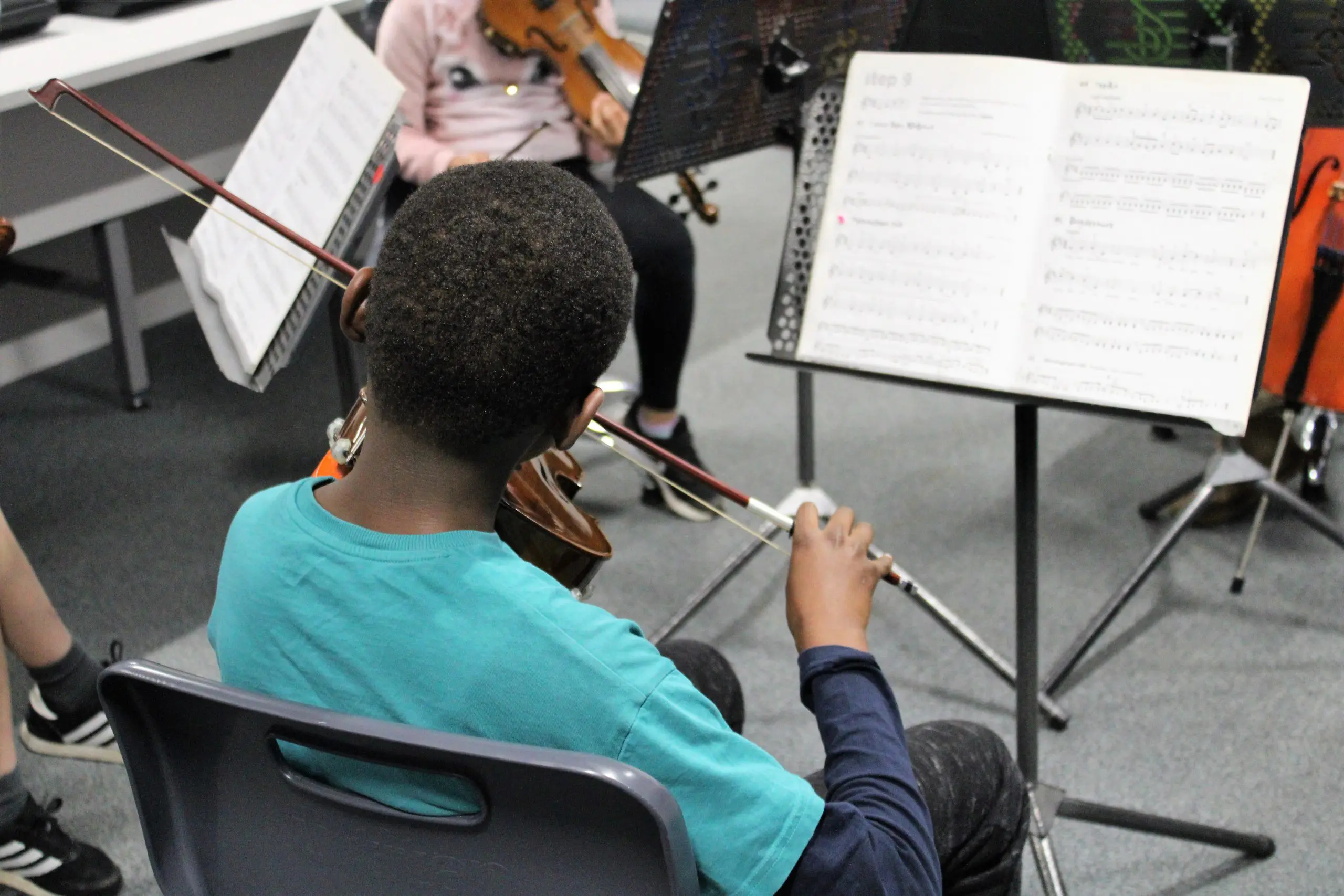 Boy playing violin at Ashford Music Centre