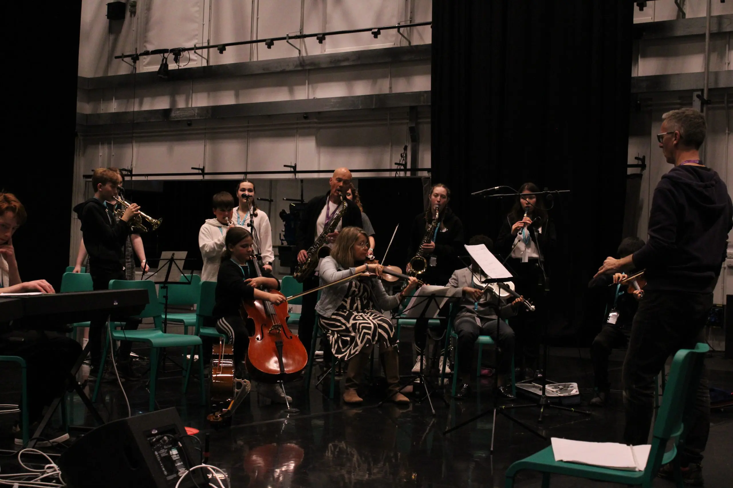 Students playing musical instruments in an ensemble for Orchestra One course in collaboration with Jasmin Vardimon Company